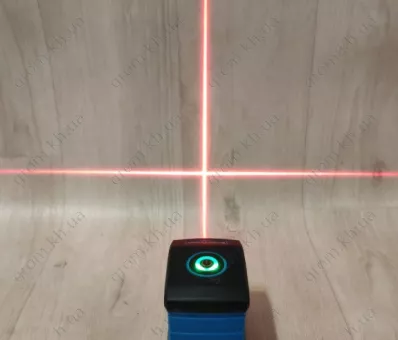 Фото 1- Міні лазерний нівелір Kraissmann 2 LL 15 R з перехідником під штатив