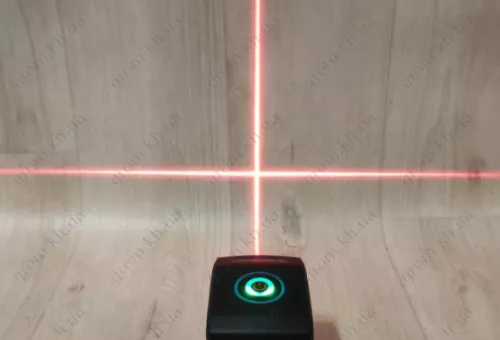 Фото 1- Міні лазерний нівелір Kraissmann 2 LL 15 R з перехідником під штатив