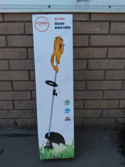 Фото 1- Коса электрическая Power Craft 122HM 1200Вт с ножом и леской